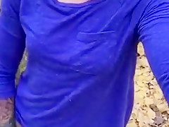 Horny tattooed milf at it again in the woods with anal dildo