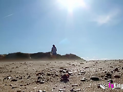 Masturbating in nude beach while guys watch and jerk off