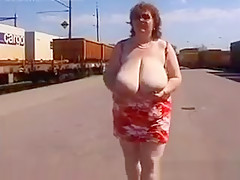 Mature Woman Shows Off Her Tits Outside
