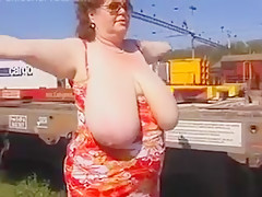 Mature Woman Shows Off Her Tits Outside