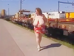 Mature Woman Shows Off Her Tits Outside