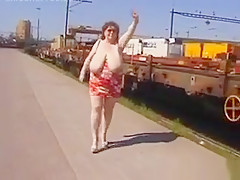 Mature Woman Shows Off Her Tits Outside