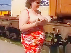 Mature Woman Shows Off Her Tits Outside