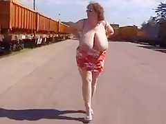 Mature Woman Shows Off Her Tits Outside