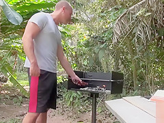 Girlfriend's wanna bite of the biggest hot dog in the park