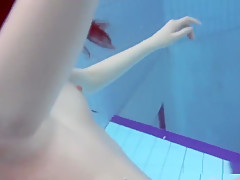 Roxalana Swims Like A Fish With Her Tight Pussy