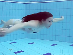 Roxalana Swims Like A Fish With Her Tight Pussy
