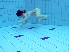 Roxalana Swims Like A Fish With Her Tight Pussy