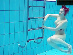 Tattooed Baby Swirls Underwater
