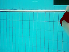 Tattooed Baby Swirls Underwater