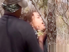 African Chick Blowing Two Stiff Cocks Outdoors