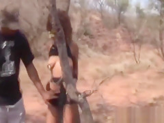African Chick Blowing Two Stiff Cocks Outdoors
