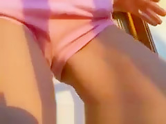 Chick Teasing Herself In The Sunset