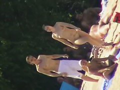 Cool babes with delicious tits taking sunbaths on a nude beach