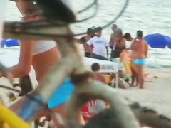 Hot beach voyeur with hot babes in tight shorts playing volleyball