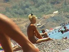 Amazing hotties bathing in sun at the beach