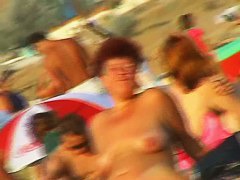 Naked hotties showing their pussies at the beach