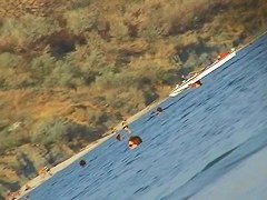 Naked hotties showing their pussies at the beach