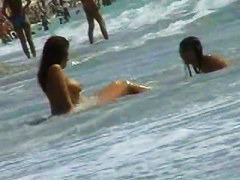 Nudity beach voyeur video of hot two brunettes by the sea