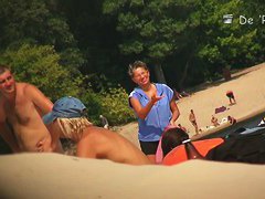 big and firm tits on the beach and a dissapearing thong