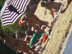 Sexy people on the beach having fun voyeur video