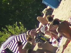 Sexy people on the beach having fun voyeur video