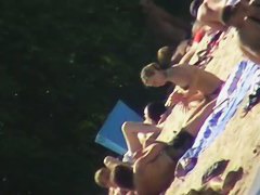 Sexy people on the beach having fun voyeur video
