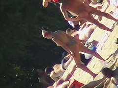 Sexy people on the beach having fun voyeur video