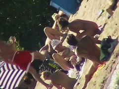 Sexy people on the beach having fun voyeur video