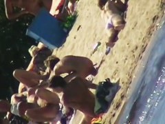 Sexy people on the beach having fun voyeur video