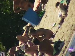 Sexy people on the beach having fun voyeur video