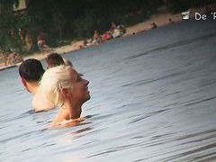Black hair topless woman in the nude beach candid video