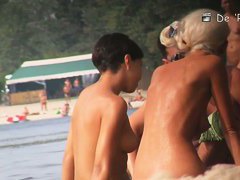 Black hair topless woman in the nude beach candid video
