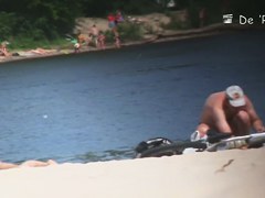 Beach voyeur hunter hiding and shooting nude people