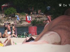 Beach voyeur hunter hiding and shooting nude people