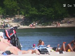 Beach voyeur hunter hiding and shooting nude people