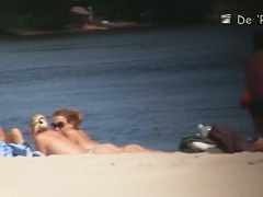 Beach voyeur hunter hiding and shooting nude people