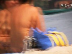 Mature hotties filmed by a nude beach pervert