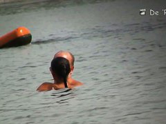 Mature hotties filmed by a nude beach pervert