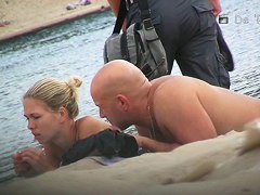 Beach girl nudist spreading her legs and showing off her sweet wet pussy