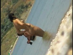 Crazy chicks don't hesitate to tan completely naked at the public beach