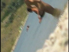 Crazy chicks don't hesitate to tan completely naked at the public beach