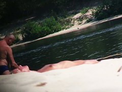 Hot nude blonde sunbathing filmed by hidden beach camera
