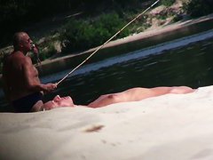 Hot nude blonde sunbathing filmed by hidden beach camera