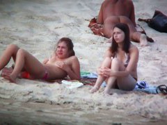 Beach spy voyeur captures two friends sunbathing topless
