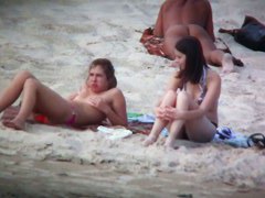 Beach spy voyeur captures two friends sunbathing topless