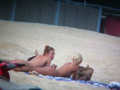 Beach spy voyeur captures two friends sunbathing topless