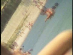 Candid beach shots of girls fooling around with their camera