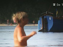 Hidden camera films beach nudist women tanning their bodies and big tits
