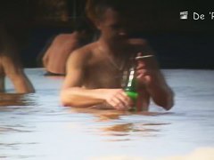 Hidden camera films beach nudist women tanning their bodies and big tits